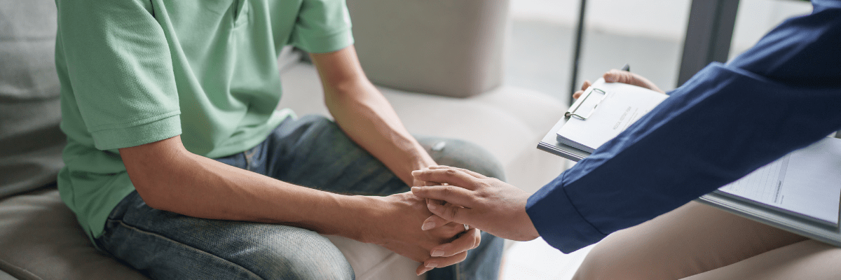 Mental Health Counseling & Support Image of two people holding hands